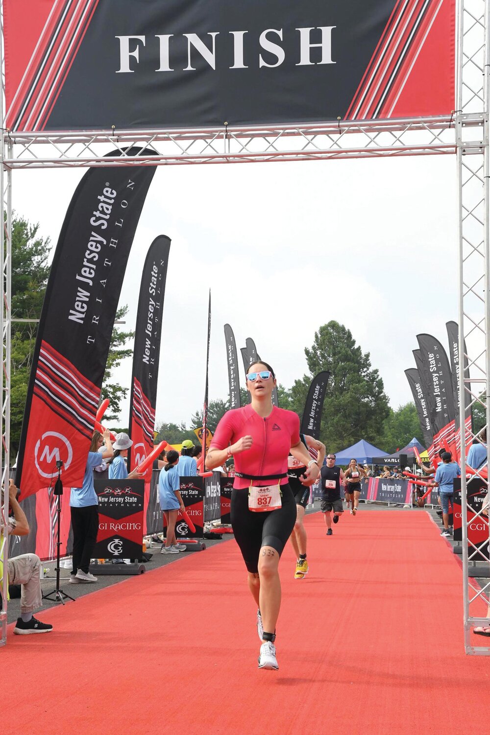 Finishing fourth out of 42 in the 40-44 age group, Jennifer Steen reaches the end of the competition at Mercer County (N.J.) Park.