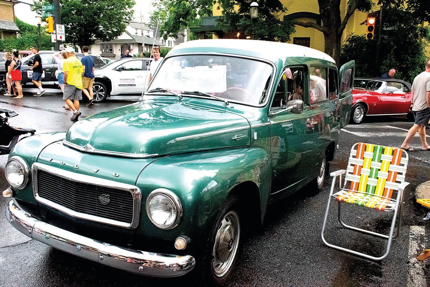 Doylestown at Dusk Car Show 2023 sponsor Keystone Motors displays a 1967 Volvo 210 Duett.