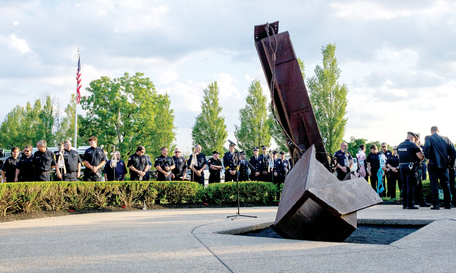 First responders gather at a vigil for the victims of the July 15 flash floods.