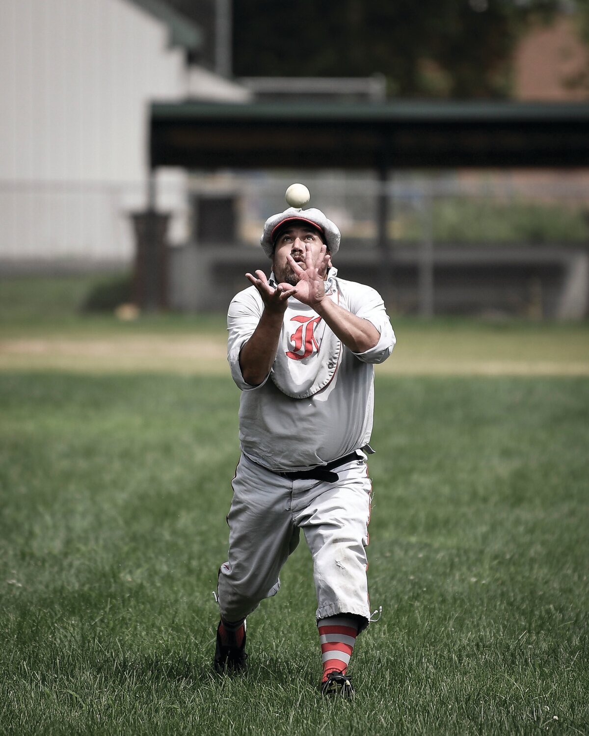 Ernie “Shredder” Albanesius makes a catch on a pop fly to left field. This is before gloves were used. Gloves weren’t introduced until the 1870s.