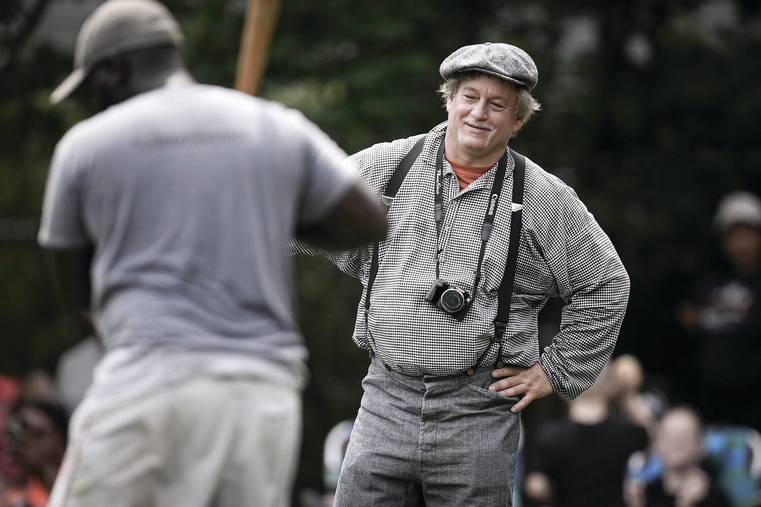 Mark “Gaslight” Granieri makes a call during the game. The umpire would stand off the side of home during games.