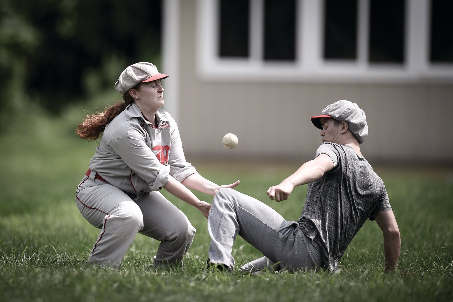 Former softball player Abby Zall tries to field a play at second base.