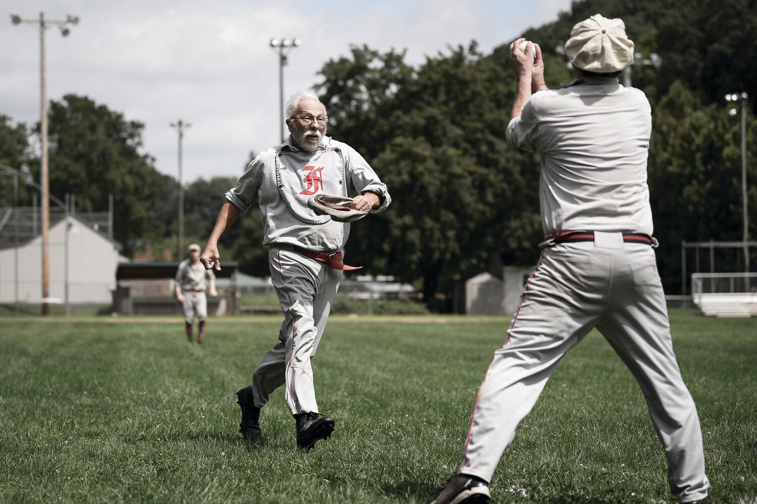 Dave “Illinois” Harris tries to score on a base hit and is tagged out at home. Harris is recovering from a recent hip surgery.