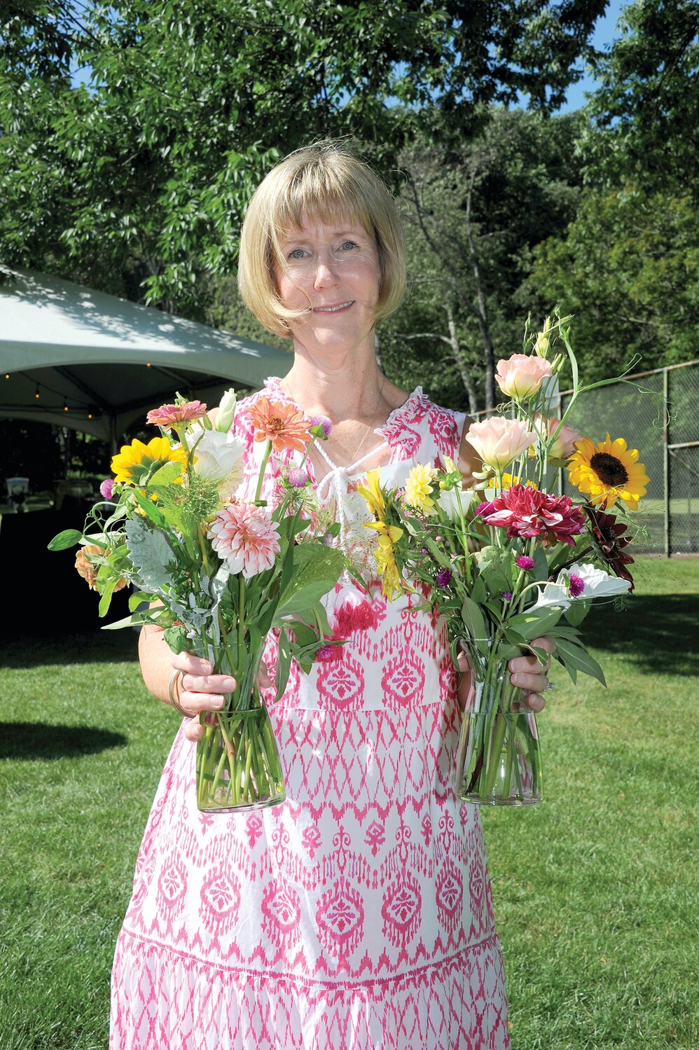 Kristen Roland holds flowers from Ann Petro.