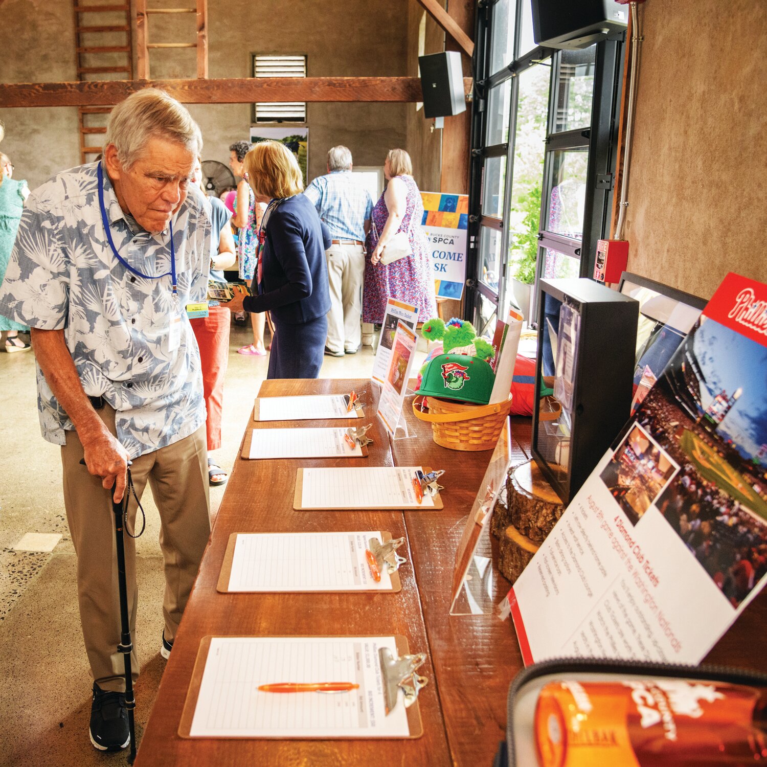 Stephen Raab checks out the silent auction.