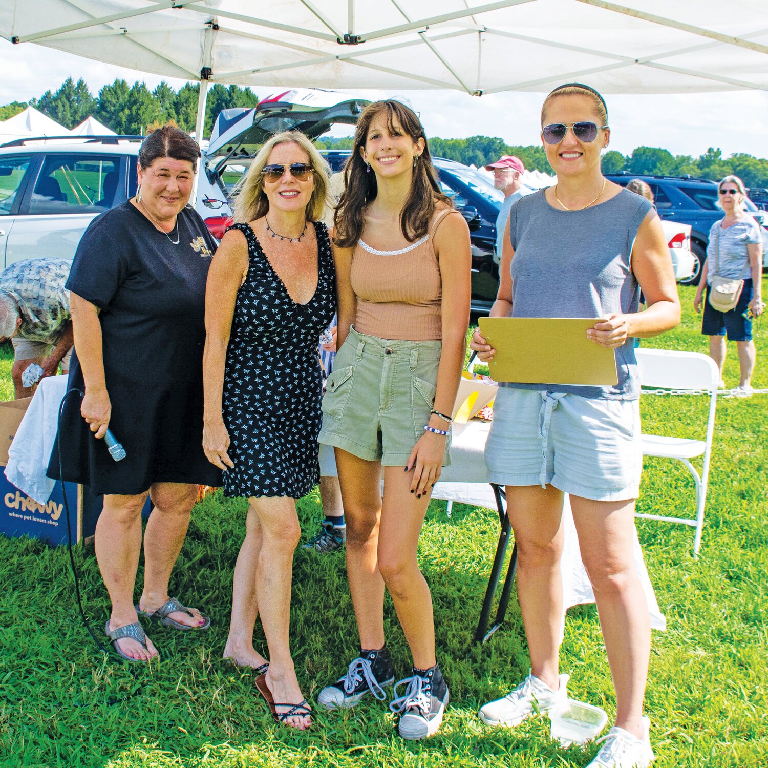 Kathy Harrington, Julie Bichaylo, Kiera Bichaylo and Dorothy Port ran the dog show Saturday.