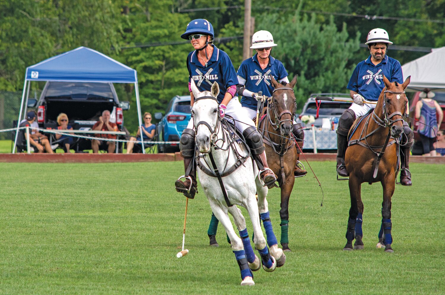 Wind Mill players compete in a polo mach Aug. 26 at Tinicum Park in Erwinna.