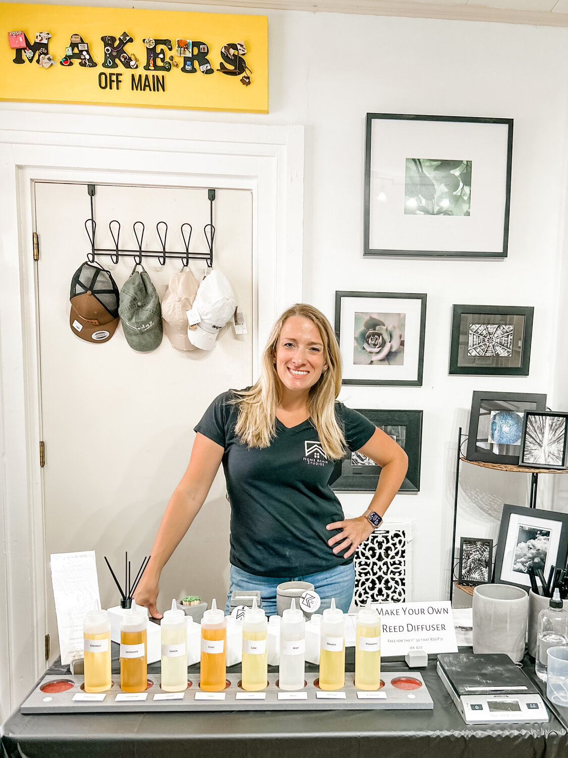 Behind the mini workshop table during an opening event at Makers Off Main is Julie Edelman with Home Again Studios.