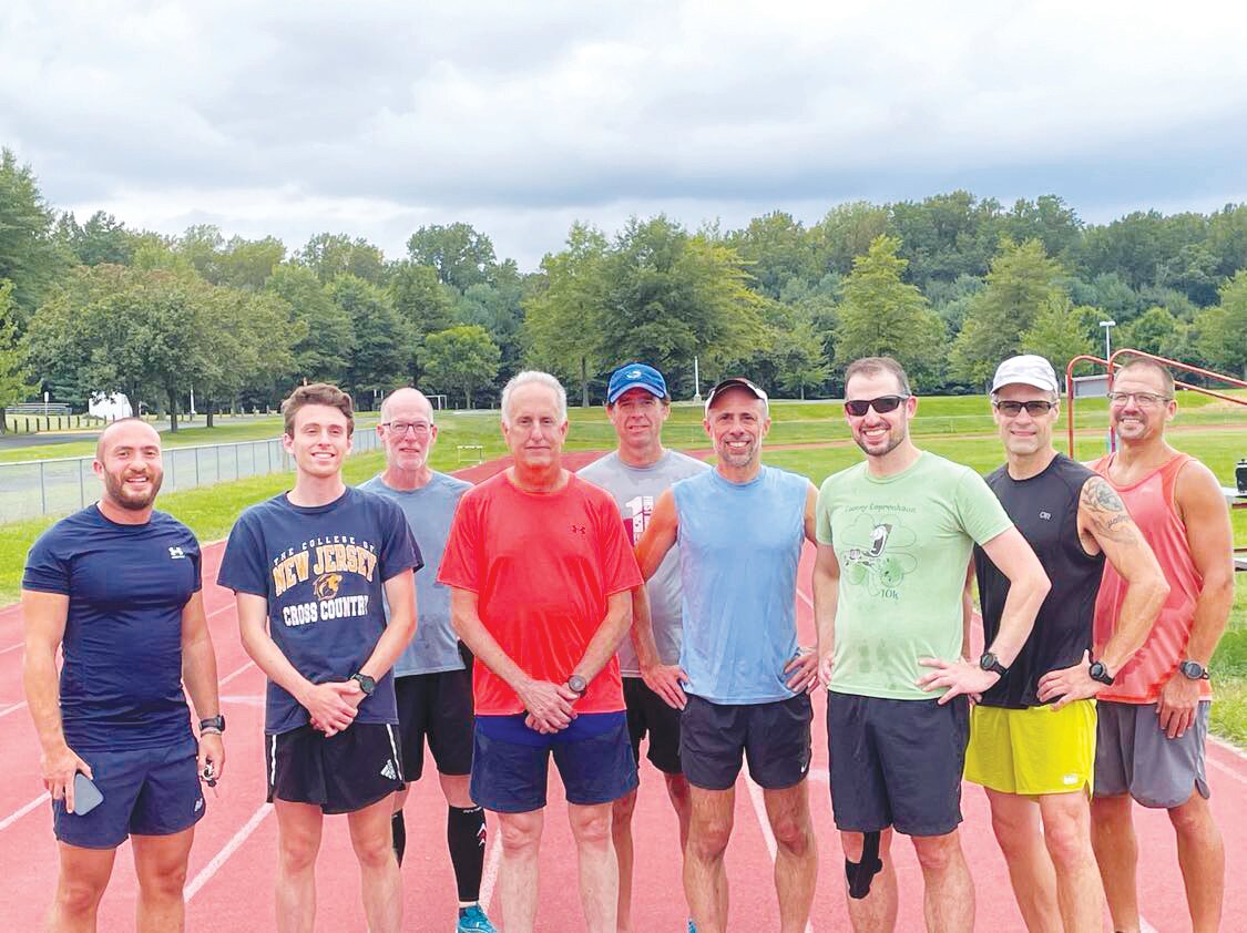 Taking part in Tuesday night track workout sessions are, from left, Hadi Kibbi, Alex Carideo, Michael Haston, Peter Carideo, Paul Lancaster, Chris Carabello, Sam Cler, John Molnar and Dan Kiley.