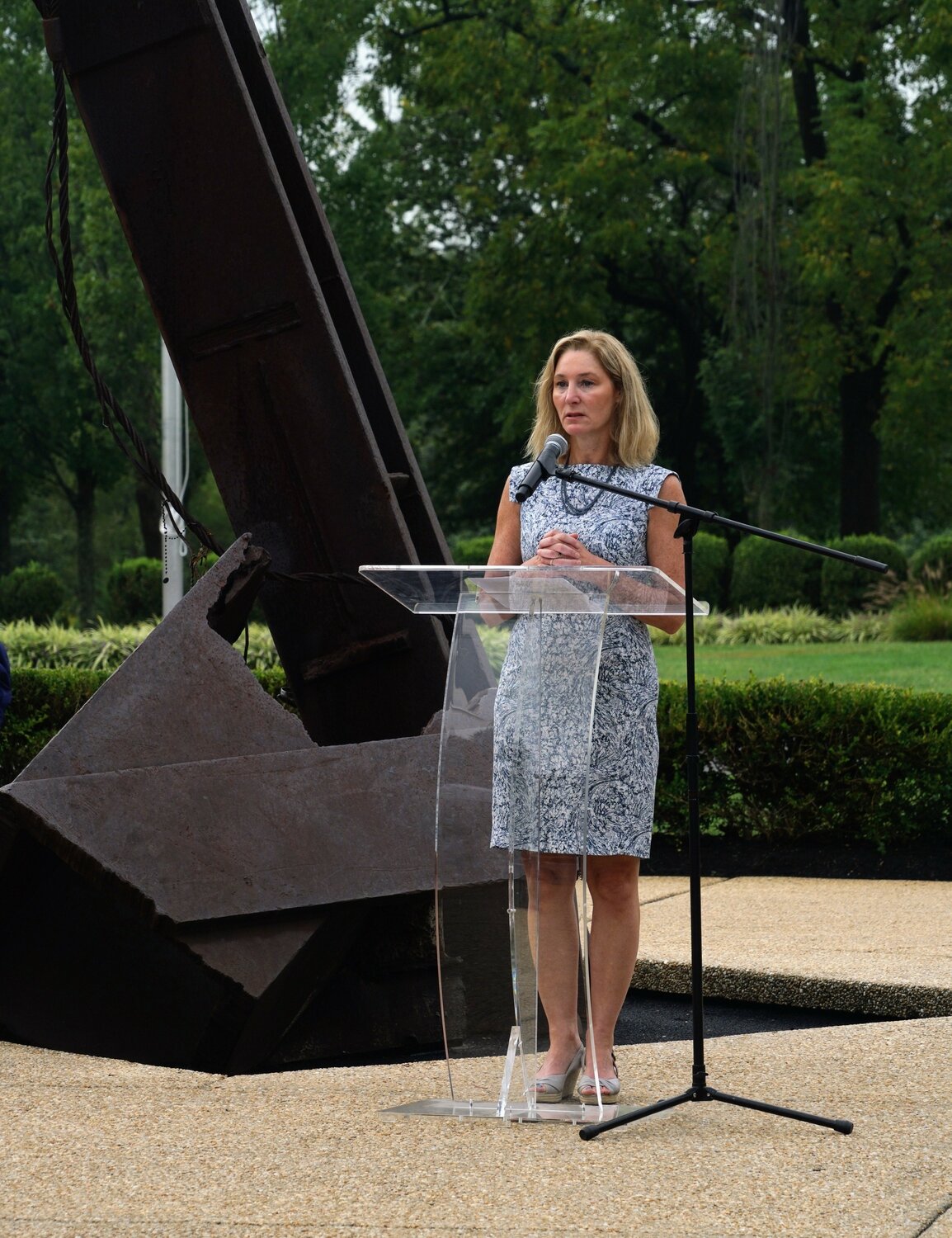 Tara Bane addresses those gathered to mark the anniversary of the terrorist attacks. Bane’s husband died in Lower Manhattan.