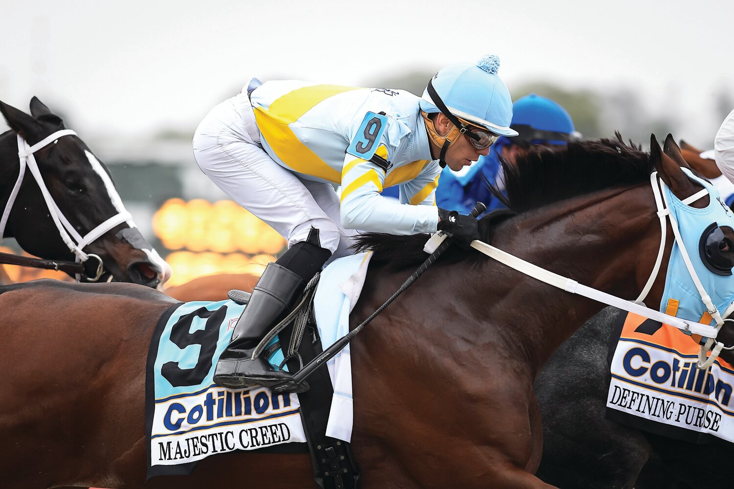 Jockey Mychel J. Sanchez on board Majestic Creed at the first turn of the Cotillion Stakes.