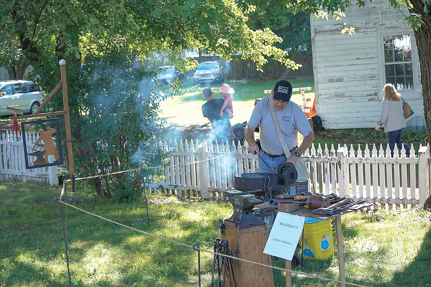 Blacksmith Robert Herrmann plies his trade during a demonstration.