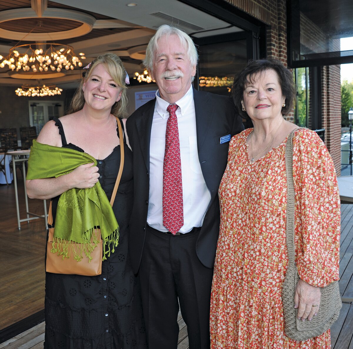 Molly Chase and Fred and Peg Logan.