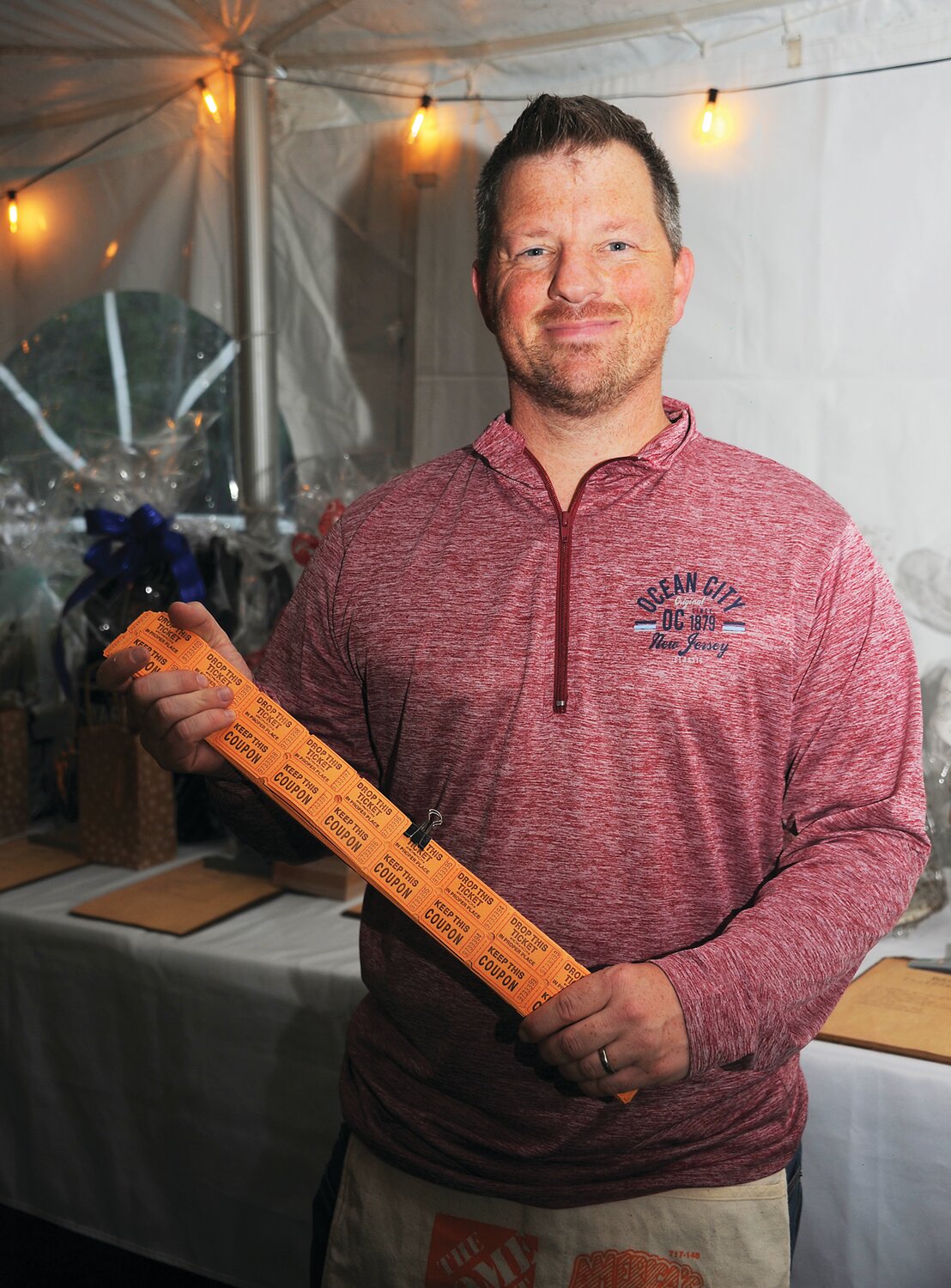 Anthony Volpe sells raffle tickets.