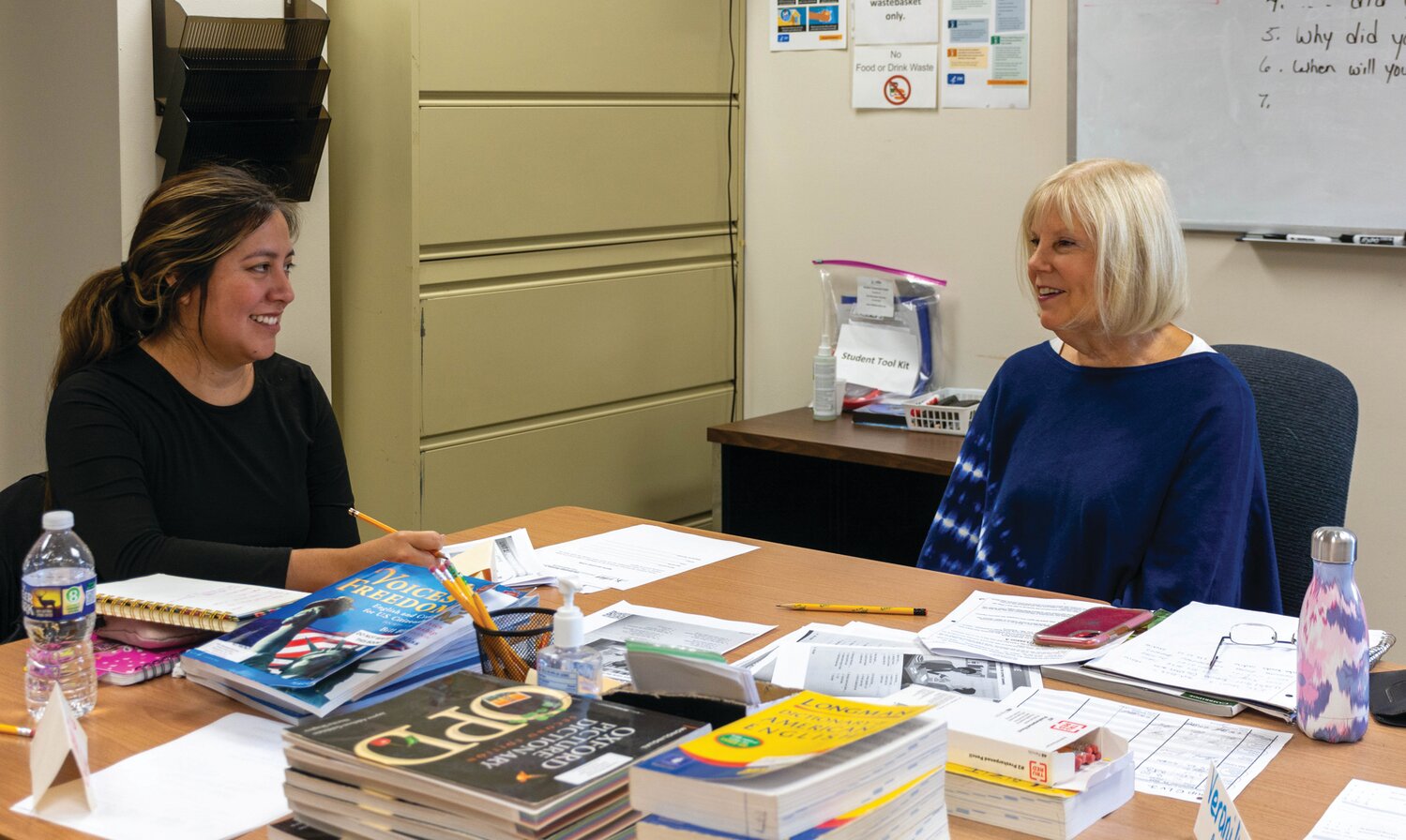 Student Mishtel Prez, who is from Mexico, talks with Shelby Gaudio, ESL Tutor, at Vita Education Services’  Doylestown office. Working with Vita is rewarding and educational for the tutors as well as the students, volunteers say.