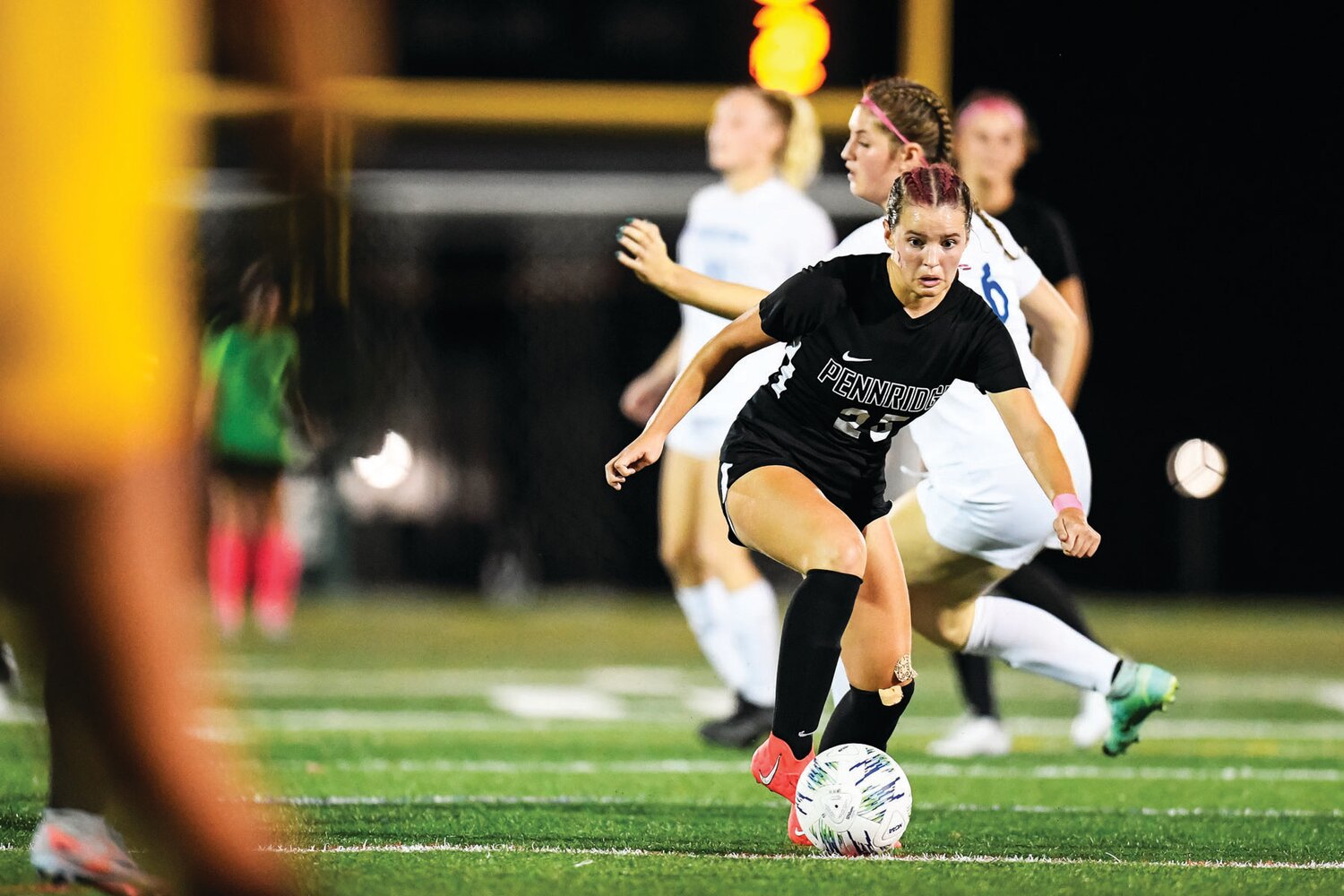 Pennridge’s Sophie Craig cuts through an opening in the middle to set up a pass for a late goal.