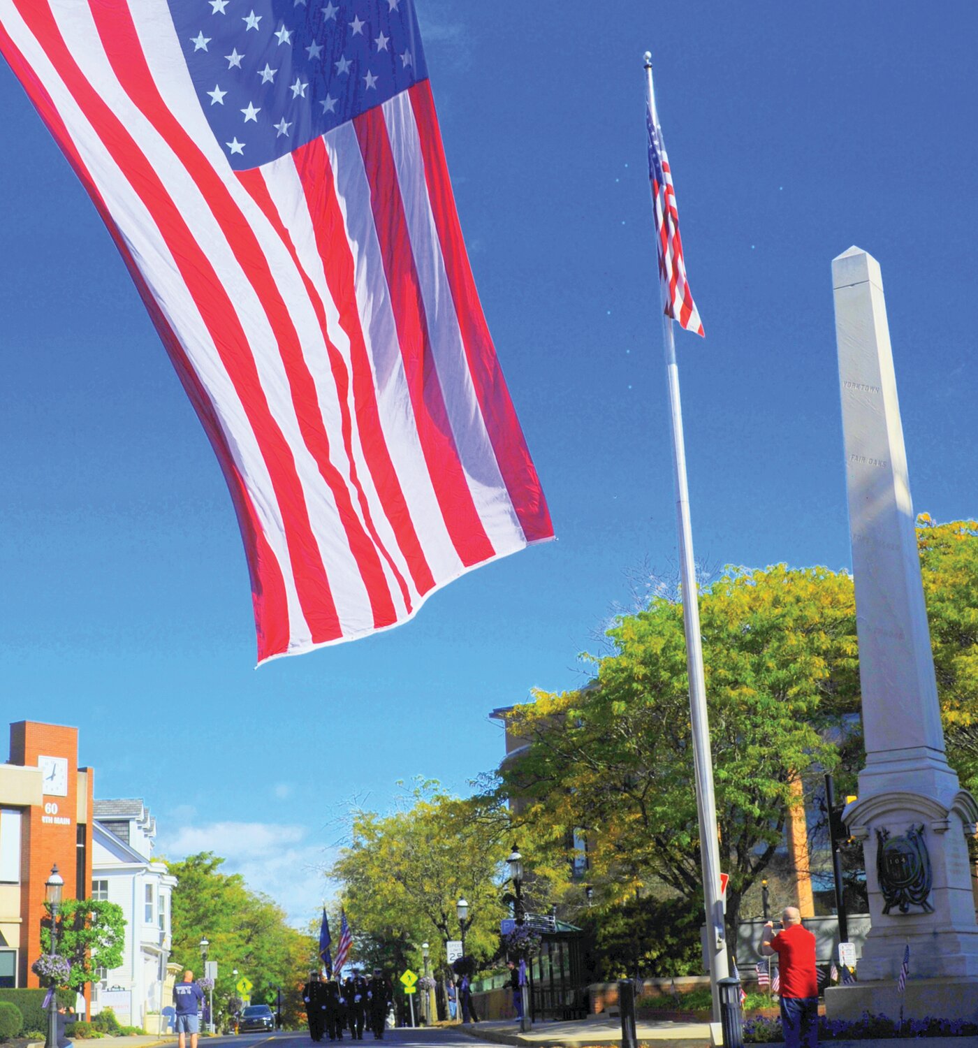 The procession heads up Main Street in Doylestown.