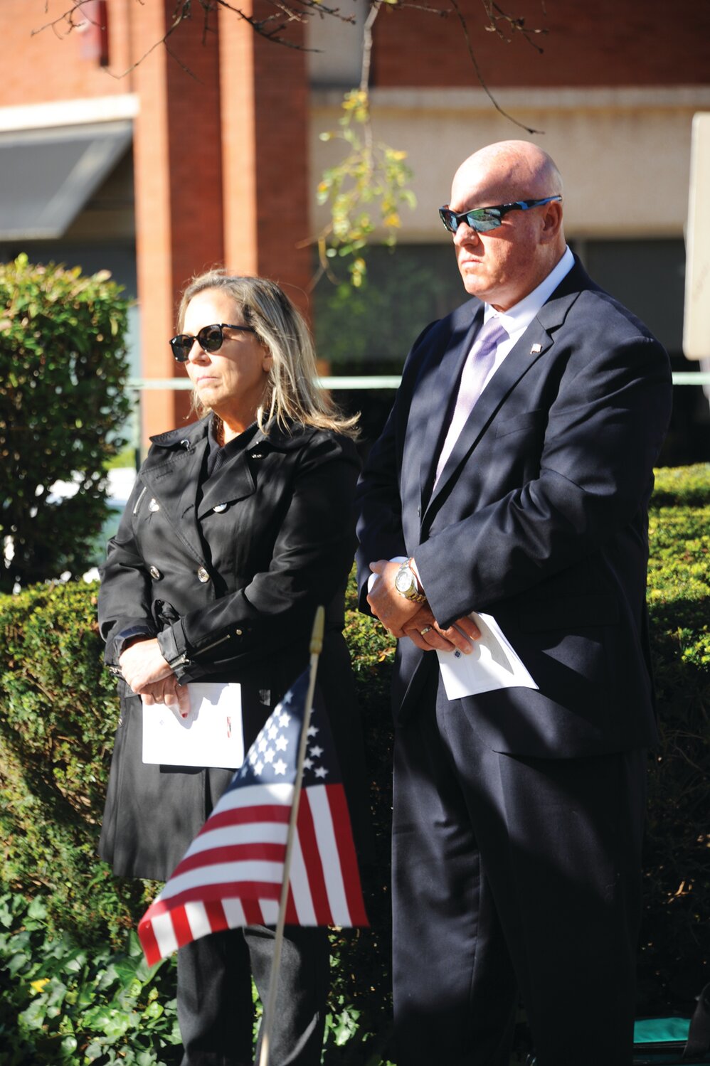 Sherry Labs, tax Collector, and Chuck Stockert attend the ceremony.