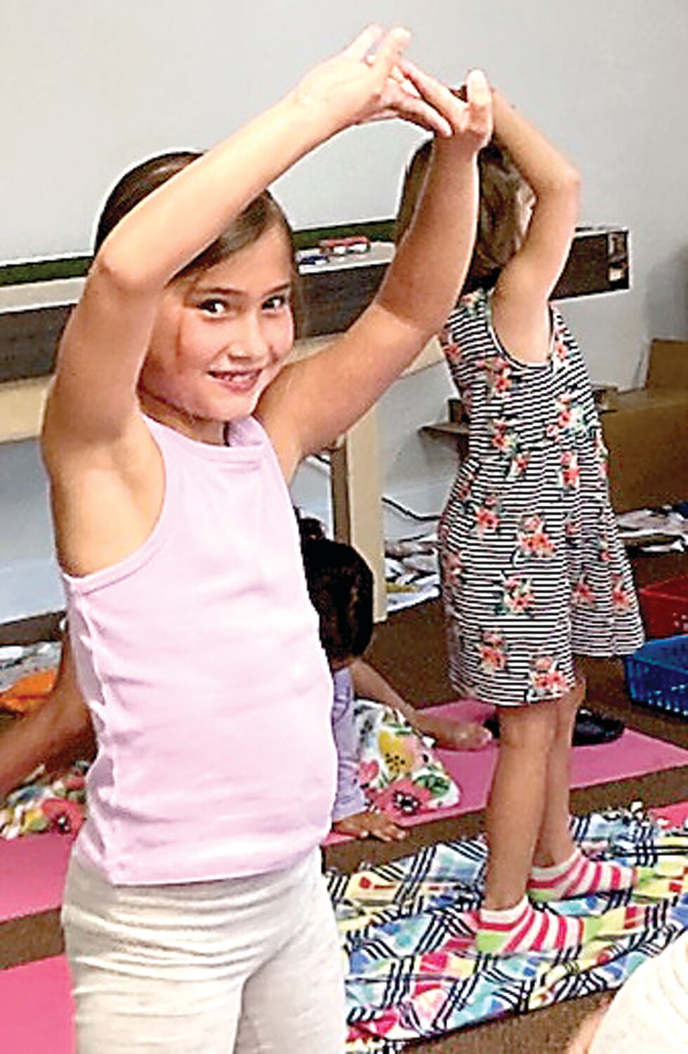 A participant in Hands Holding Hearts’ bereavement camp takes part in an activity.