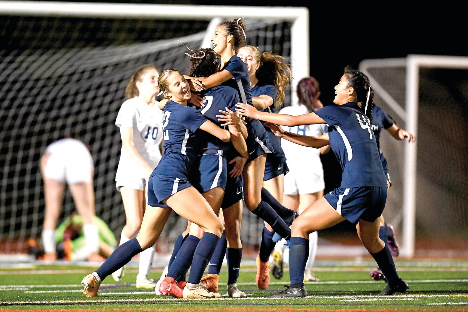 Council Rock North players celebrate the goal by Sara Tyler with just 47 seconds left in the game.