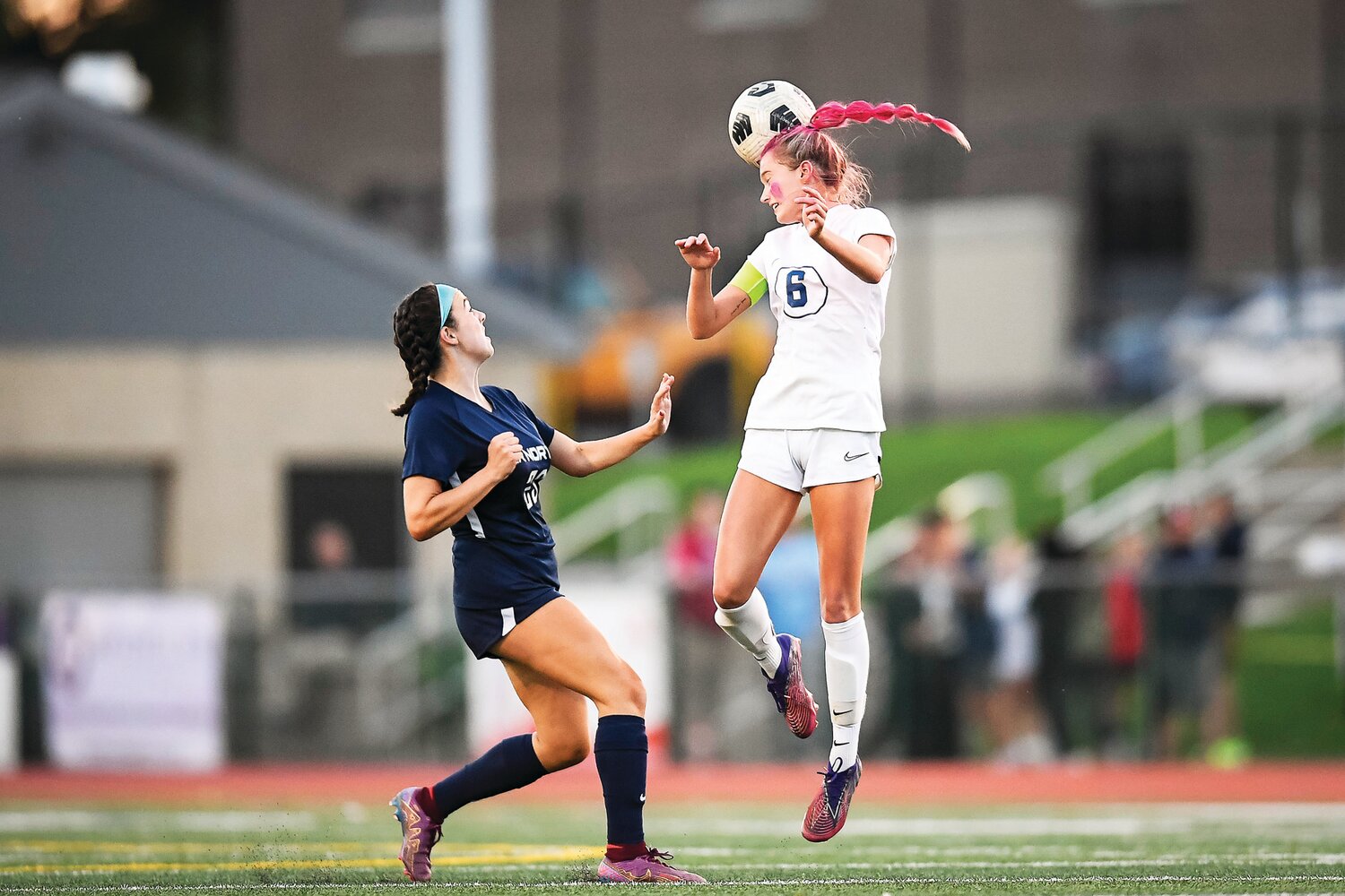 Council Rock South’s Lily Bross tries to redirect a pass on goal in front of Council Rock North’s Audrey Rogan in the first half.