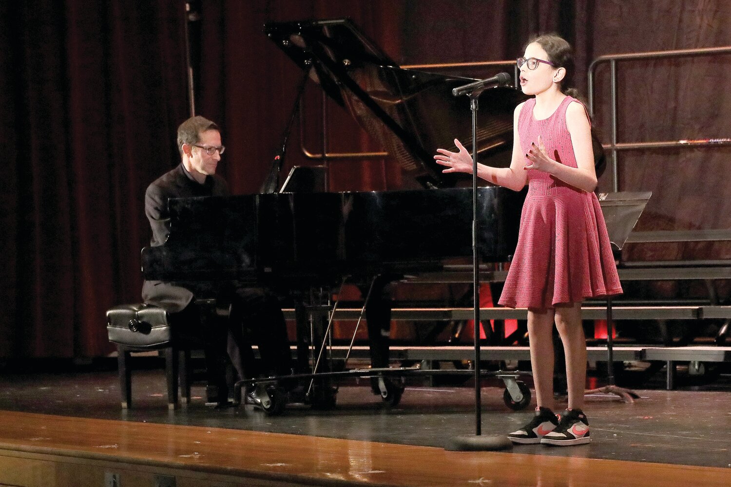 Solo Contest winner Gabrielle Arias  of Newtown enchants the audience with her performance of “Everything's Coming up Roses” from “Gypsy.”