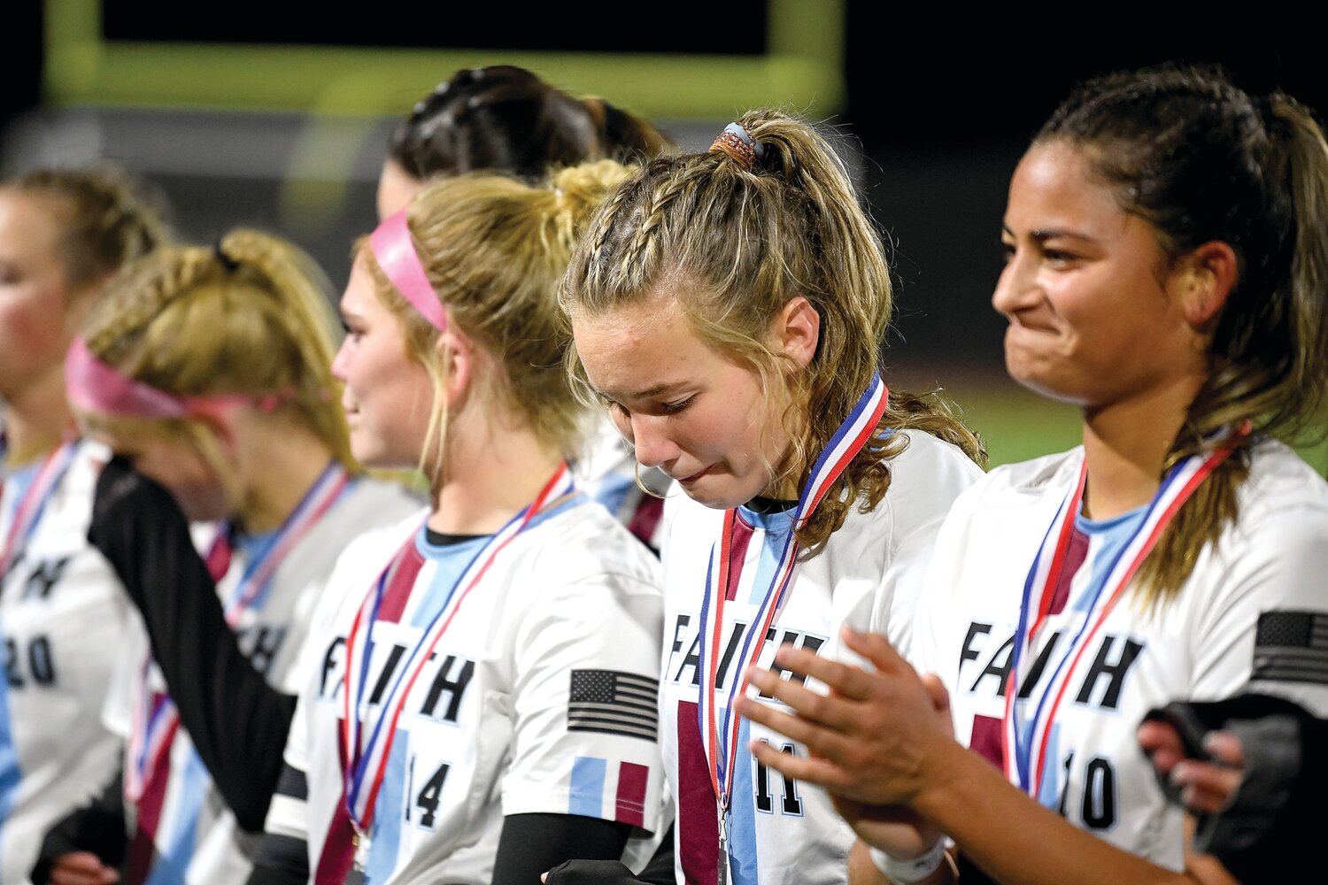 Faith Christian players can’t hold back the tears after falling to Dock Mennonite 3-0 in the district final.