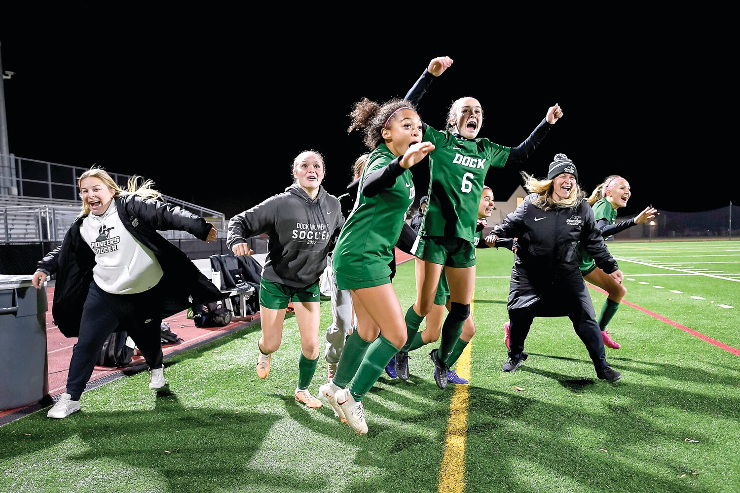 The Dock Mennonite bench after the last second ticked away, winning the title 3-0 over Faith Christian Academy.