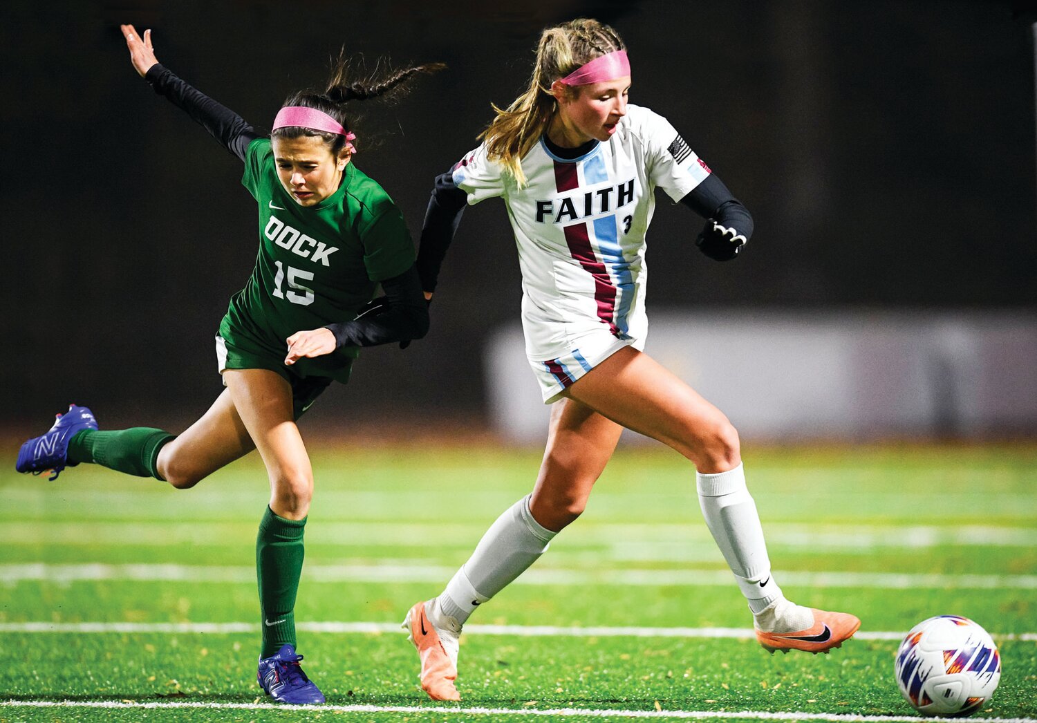 Faith Christian’s Lily Klock steals the ball away from Dock Mennonite’s Tessa Moyer.