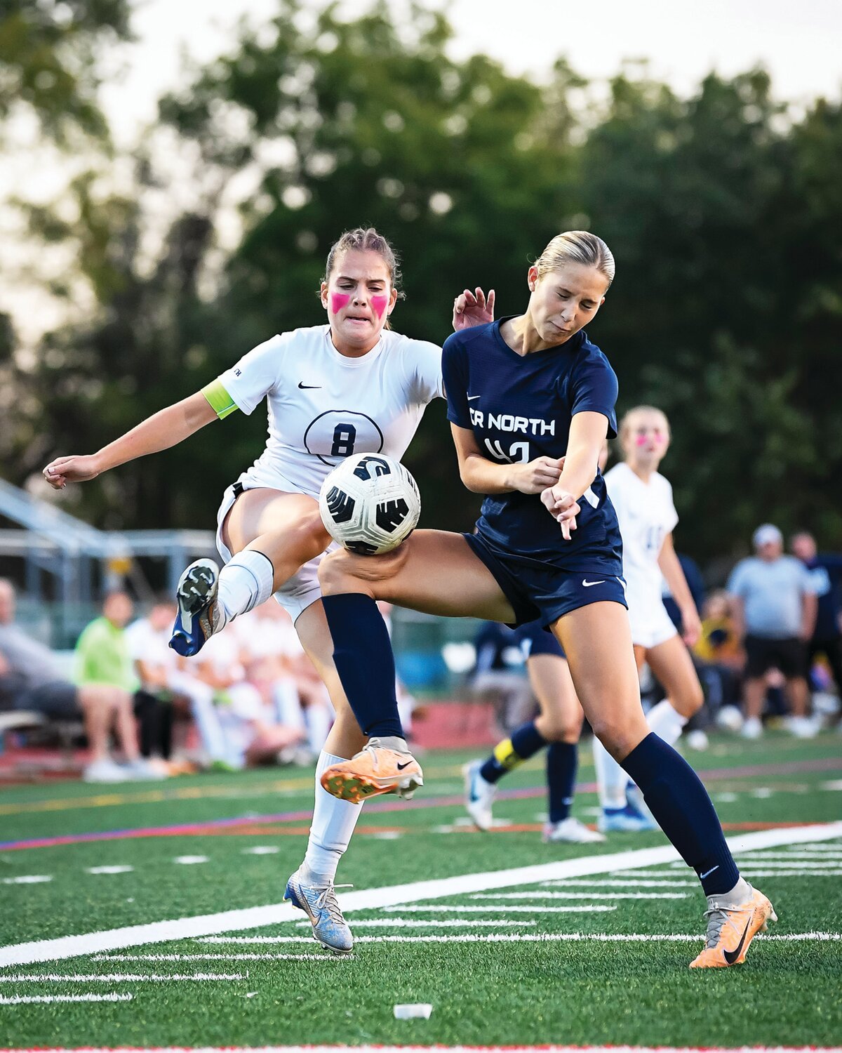 Council Rock North’s Kinsley Smith intercepts a pass intended for Council Rock South’s Cameron Blatz.