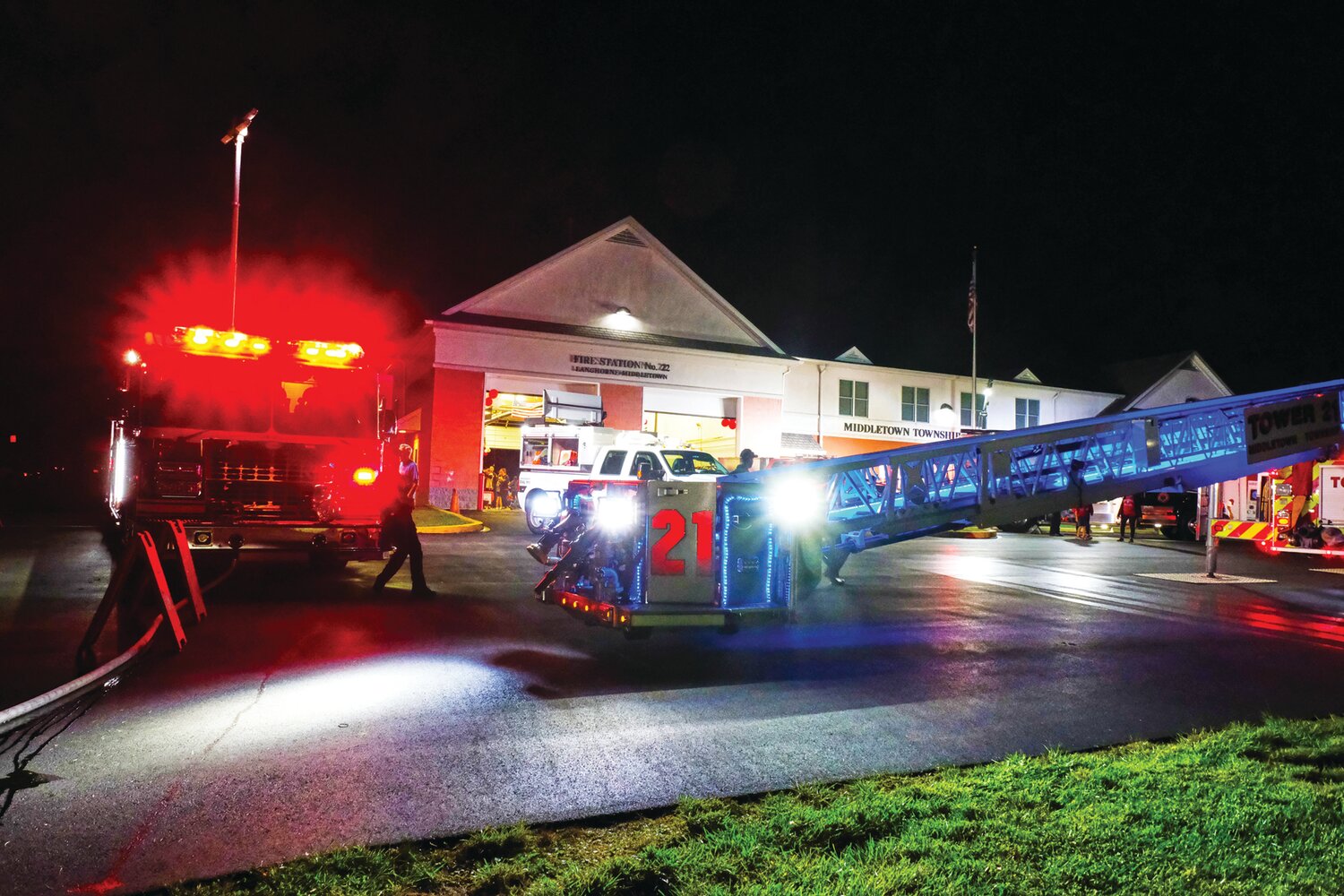 Red, white and blue lights bathe the Langhorne-Middletown Fire Co. firehouse in a patriotic glow.