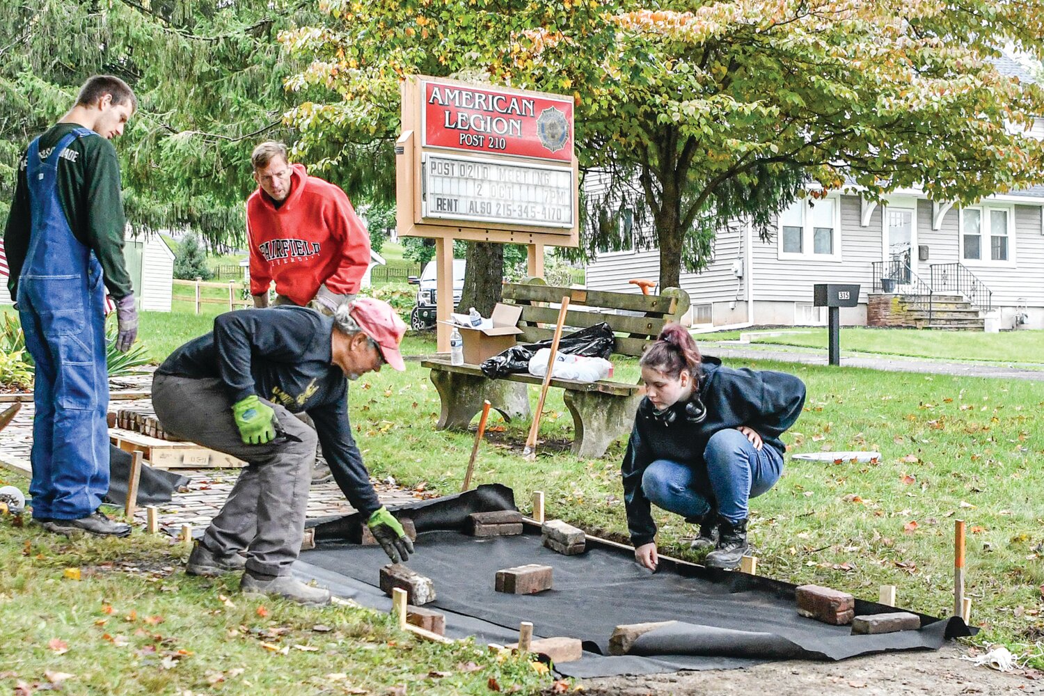 Members of Doylestown American Legion Post 210 are replacing the current brick path leading to the front entrance with bricks honoring and remembering those who served the U.S.