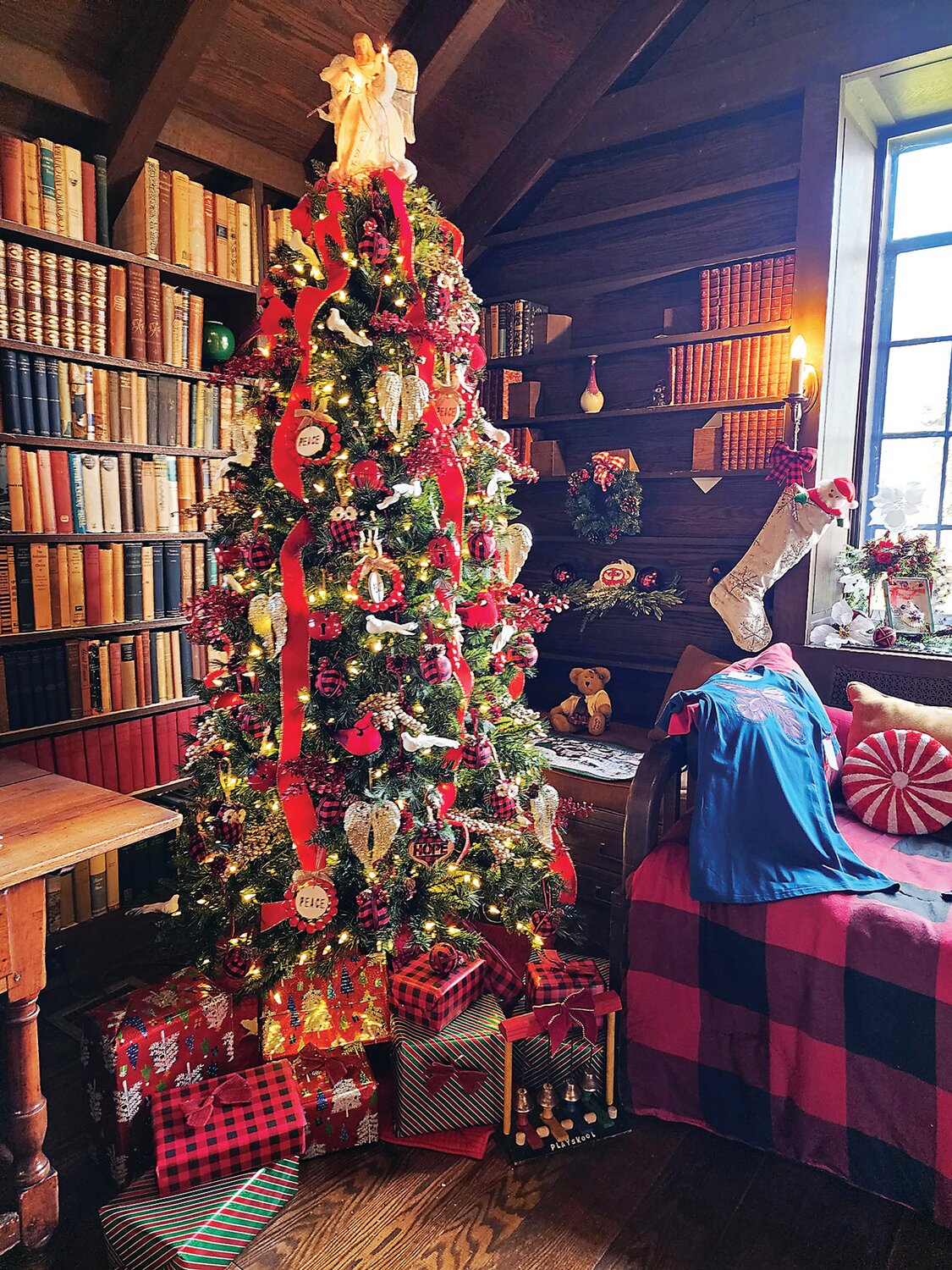 A small library daybed area display by Earth Wish Angels.