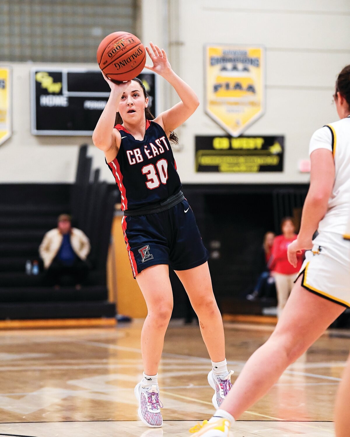 Central Bucks East’s Anna Barry locks in with a shot during the second quarter.