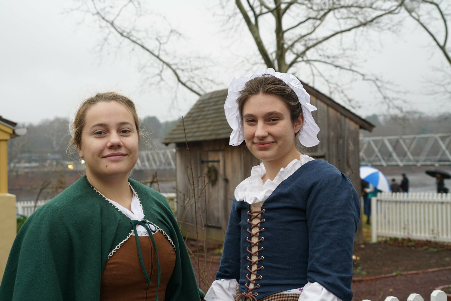 Sarah Gygax and Charlotte Combs wait for Sunday’s river crossing to begin.