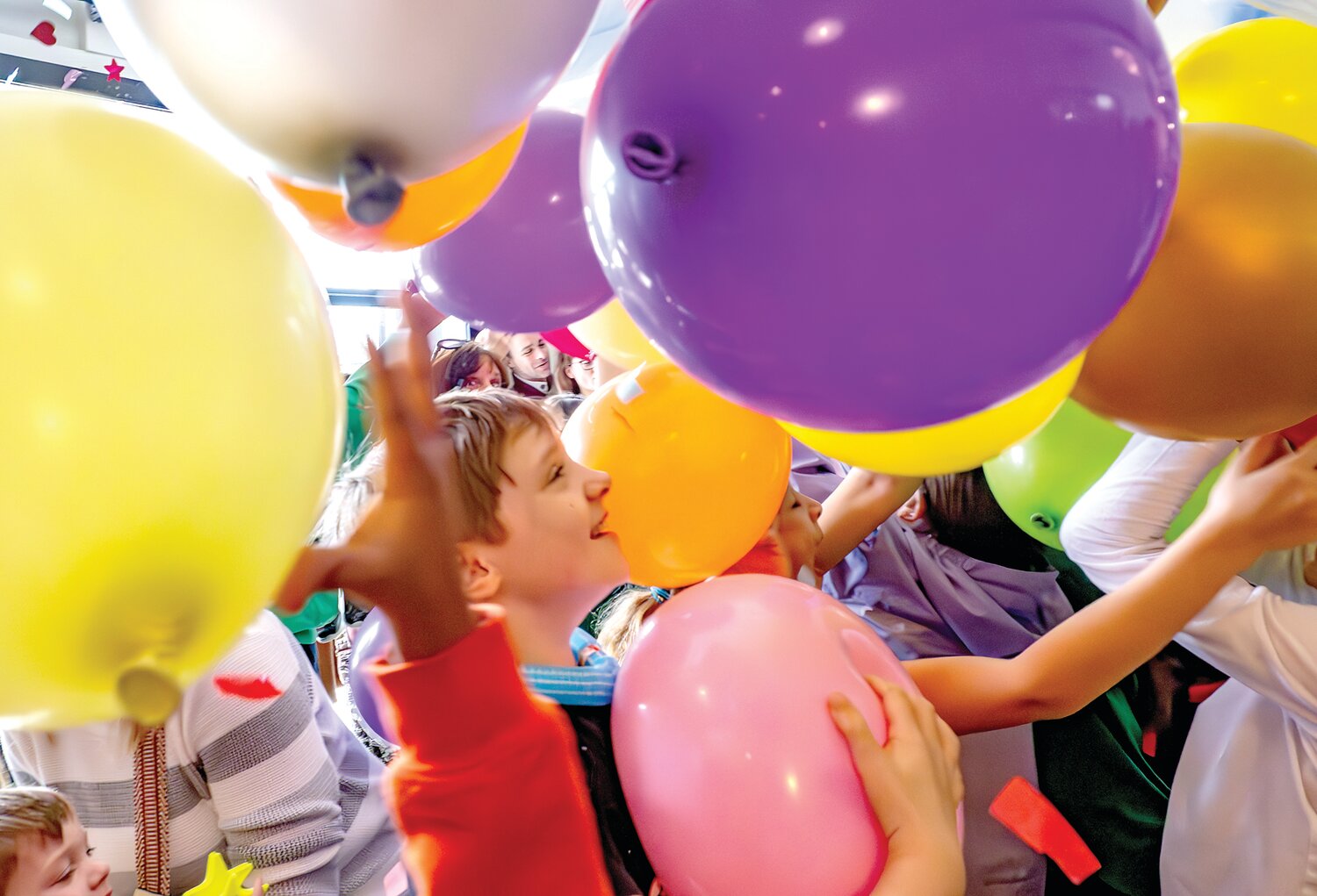 A balloon drop kicks the “Noon Year’s Eve” celebration into high gear at the Square at Dublin Town Center.