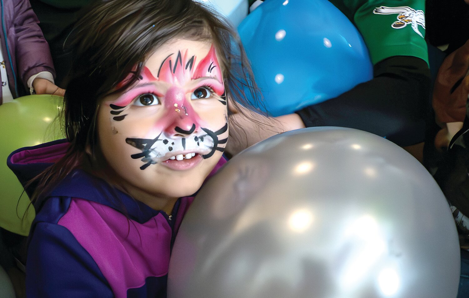 A child attends the Noon Year’s Eve Party at The Square at Dublin Town Center.