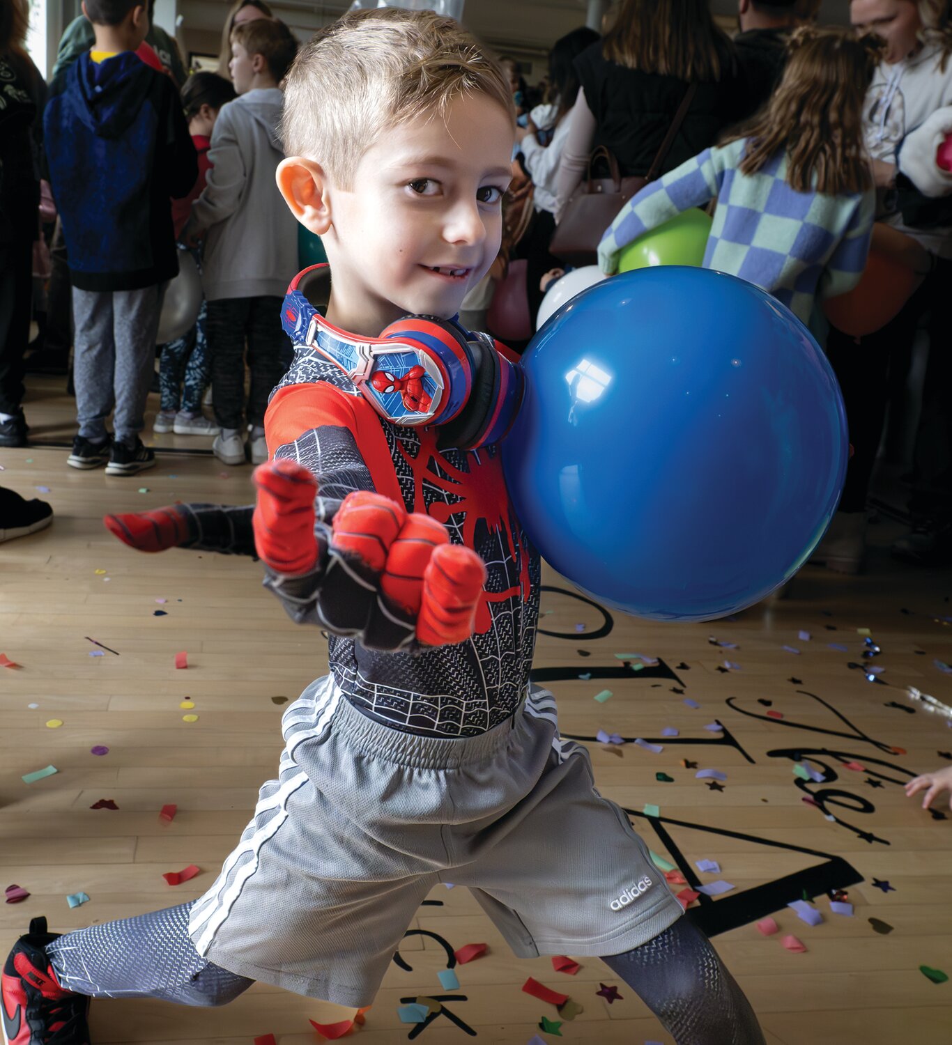 A child decked out in Spider-Man gear attends the Noon Year’s Eve Party at The Square at Dublin Town Center.