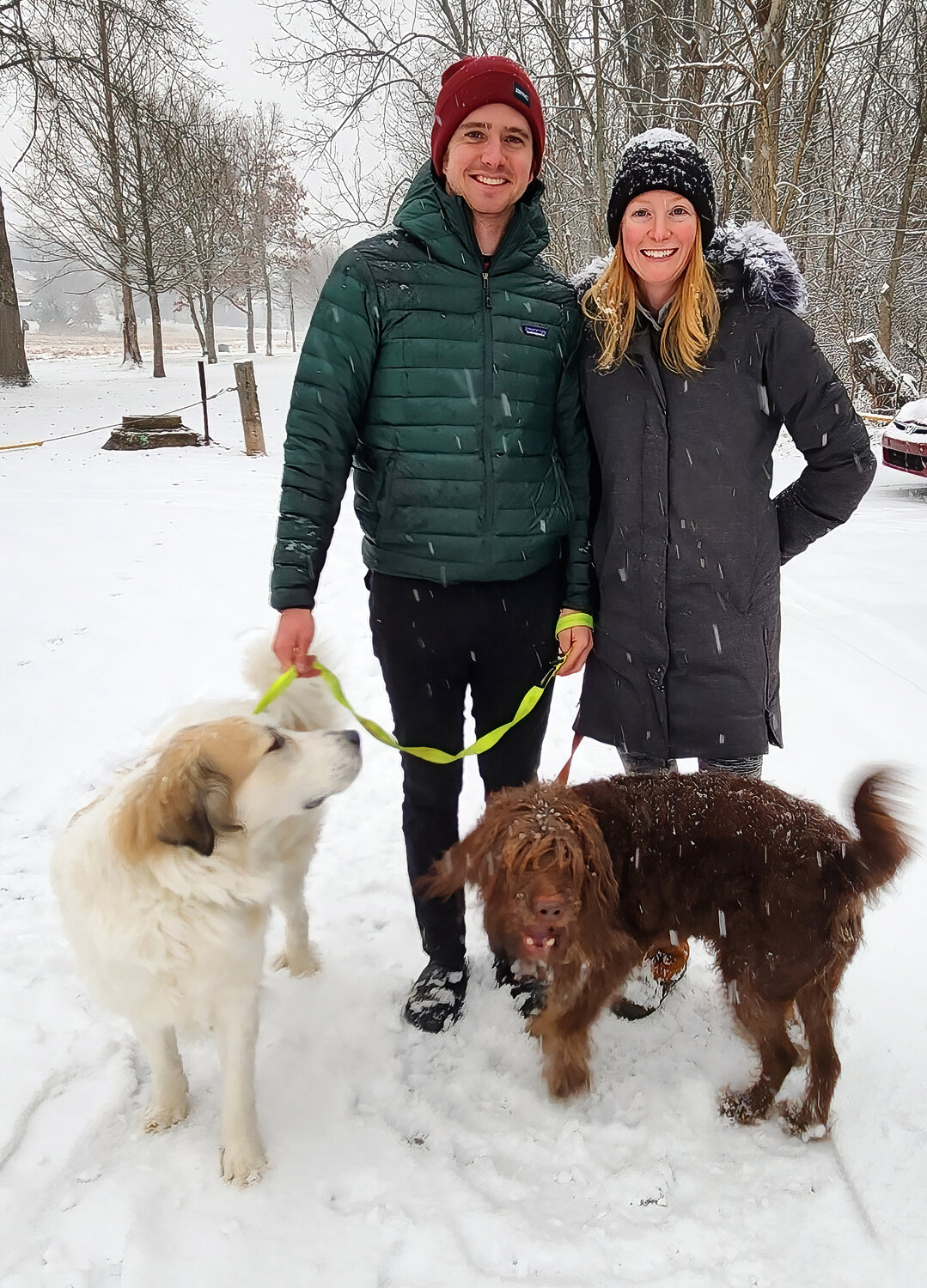 Chris and Shannon Meacham walk their pup, Feebee and George, in Perkasie.