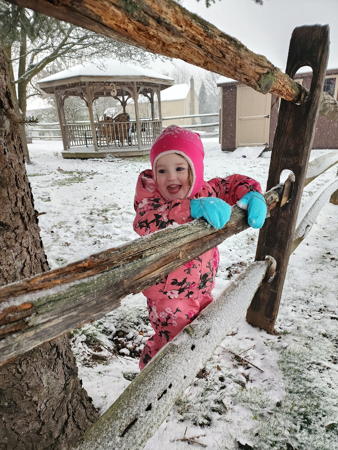 Mia White, 2, of Perkasie, enjoys a little bit of winter weather Saturday.