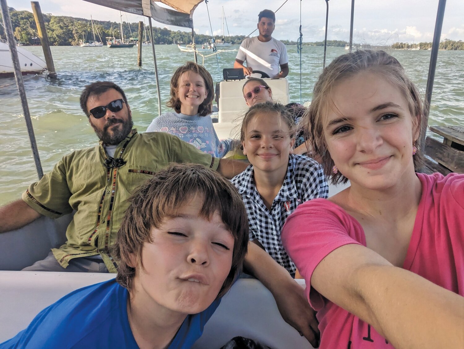 Members of the Davis family, prior to being injured in a vehicle wreck in Belize, where they were performing missionary work on behalf of the deaf community in the Central American country. From front to back, left to right, are Zephaniah, 12 and Selah, 17, father Nathanael and Zion, 15, Abi, 19, and mother Spring.