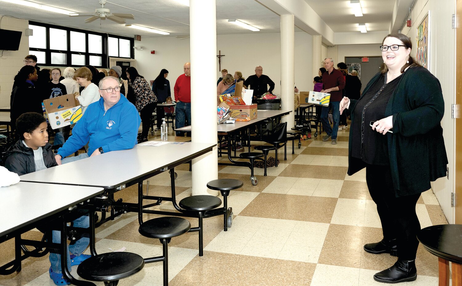 Maddie Appleby thanks attendees for taking part in Monday’s service project.