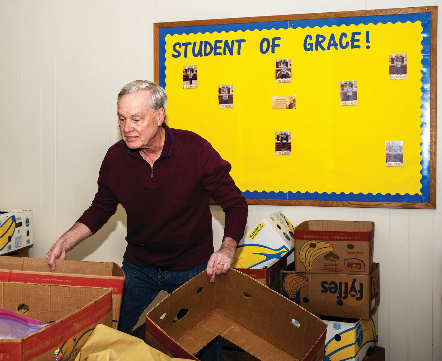 Bob Higman, Knights of Columbus Council No. 17417, lends a hand with Monday’s service project.