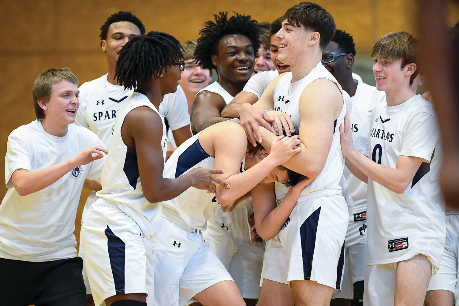 Solebury’s Joell Idrovo gets congratulated after making a shot for his 1,000th career point in the second quarter.