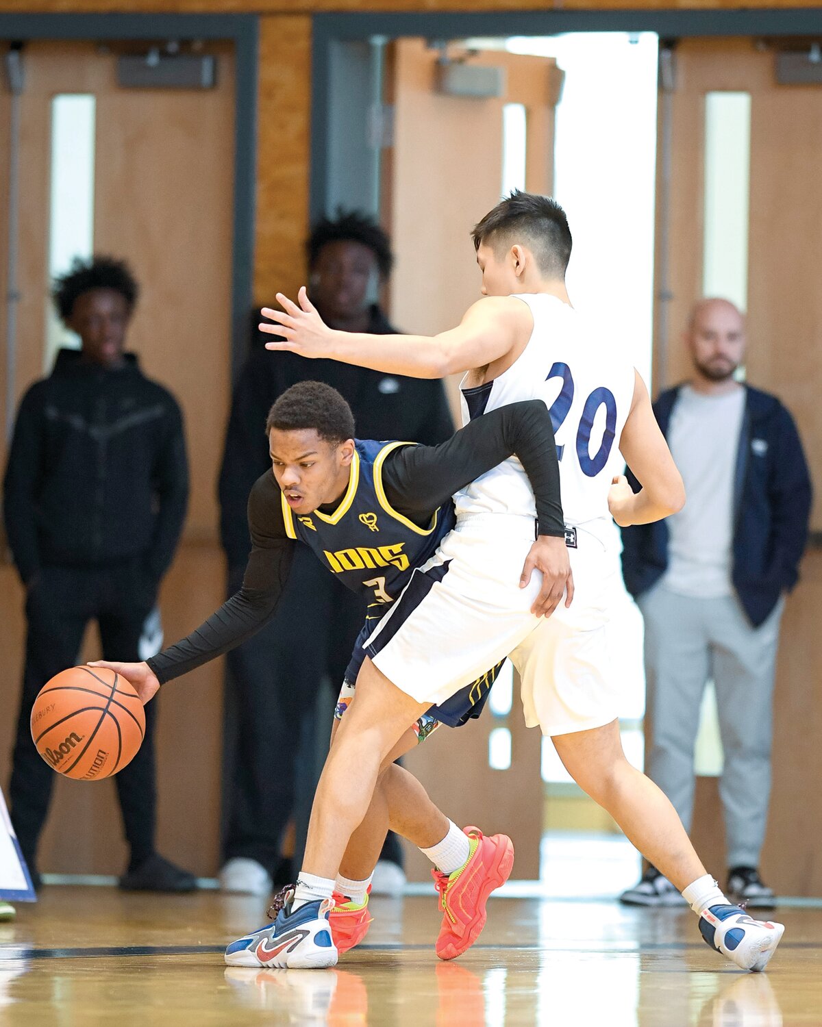 The City School’s Jaden Johnson tries to get around the tight defense of Solebury School’s Joell Idrovo.