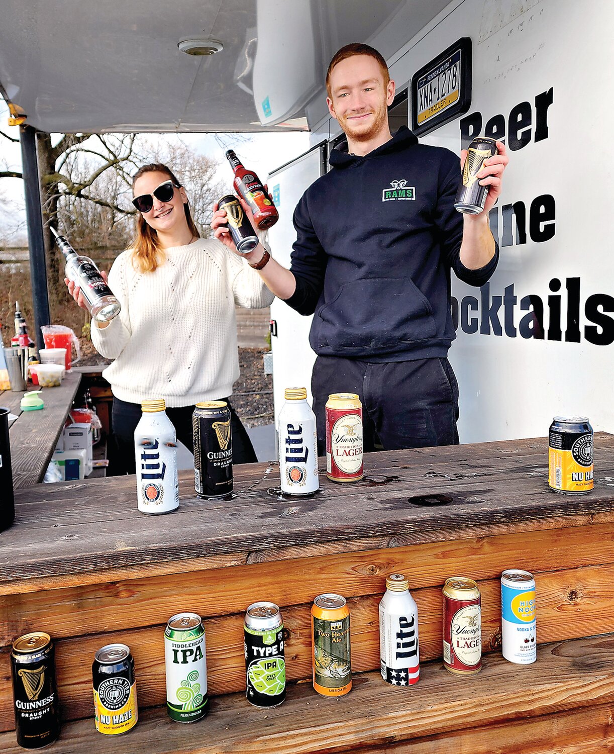 The Rams beer garden bartenders Deb Coffee and Nate Gangi enjoy the sunny Saturday afternoon during the Perkasie Ale Trail.