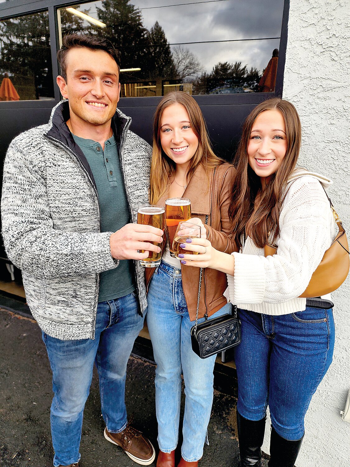 Andrew Bolton with sisters Skyler and Shelby Steward of Doylestown at their first stop on the Perkasie Ale Trial, Van Lieus Brewing Co.