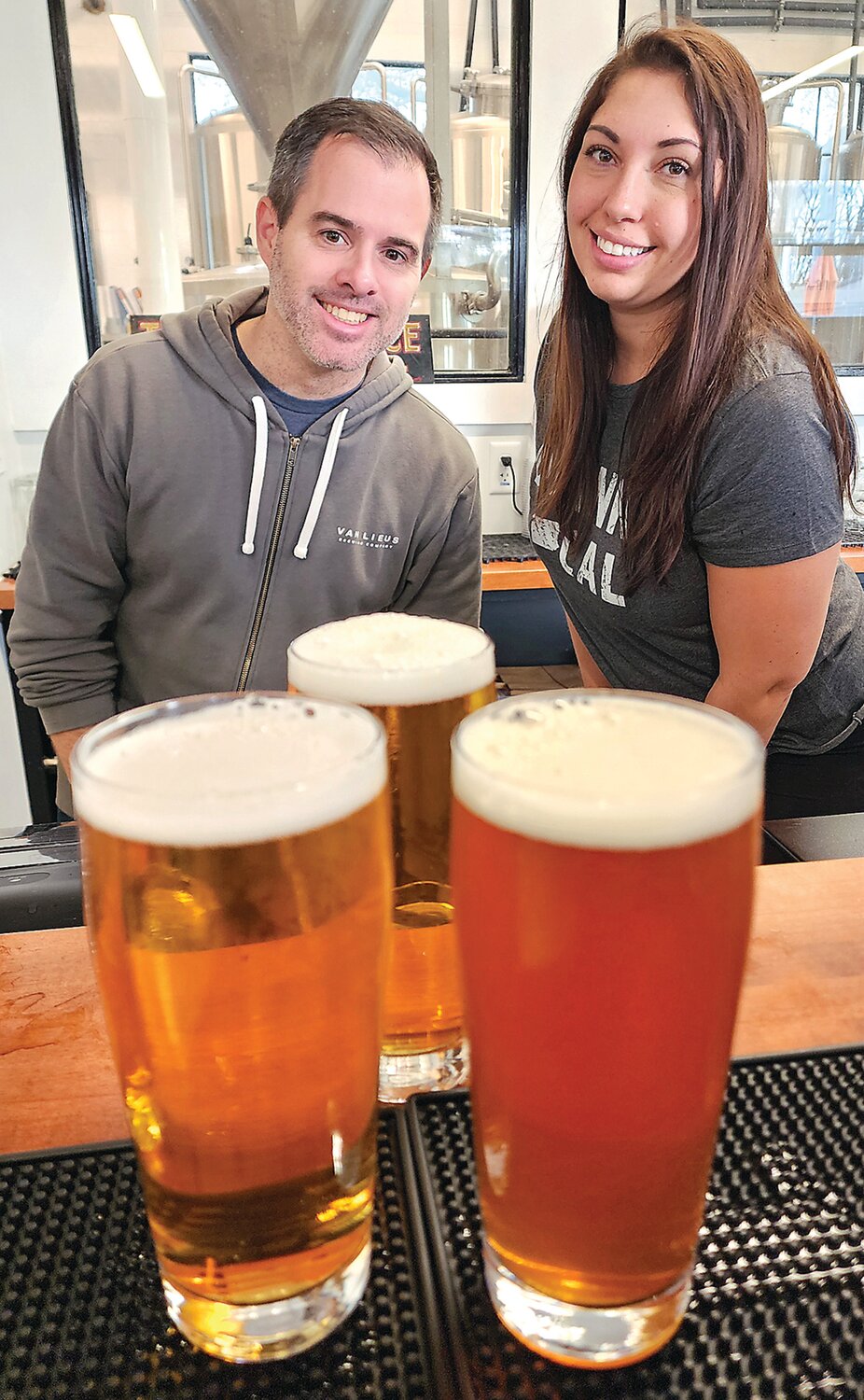 Galen Barr, owner/headmaster brewer at Van Lieus Brewing Co., and a staff member.