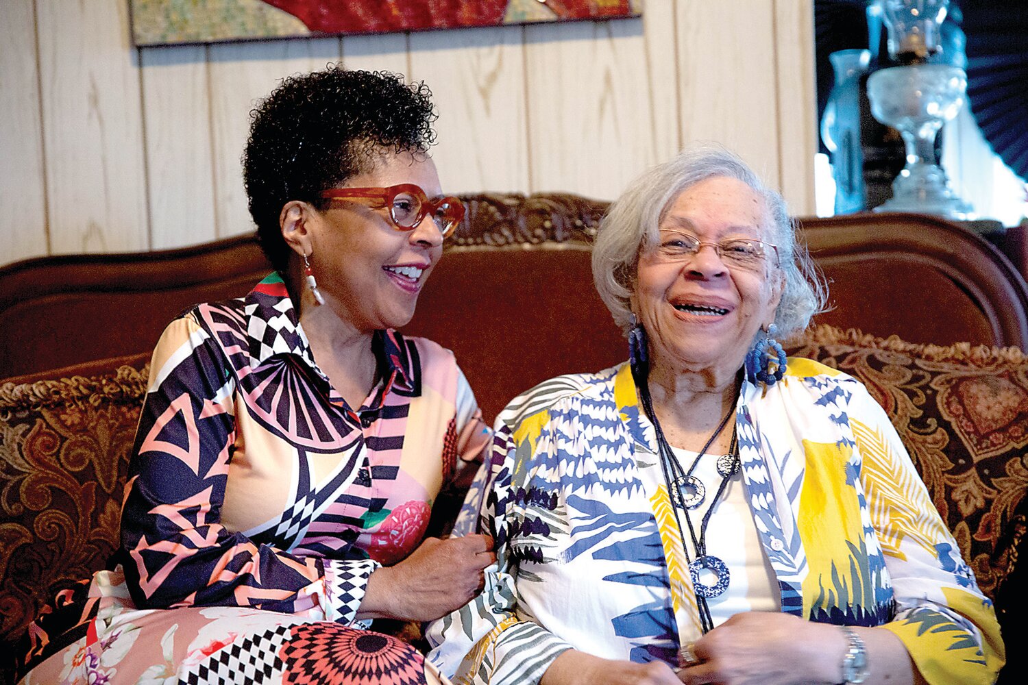 Helen Marie Vaughn Mayo, right, and her daughter, Susan Marie Mayo-Brown, sit in their family home on Pennsylvania Avenue.