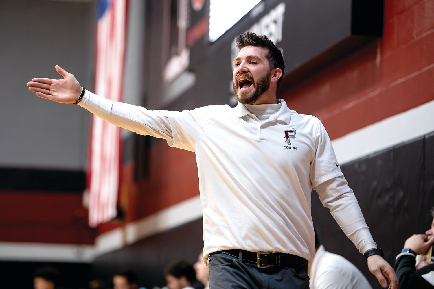 Faith Christian coach Torey LaFerney argues a call during the second half.